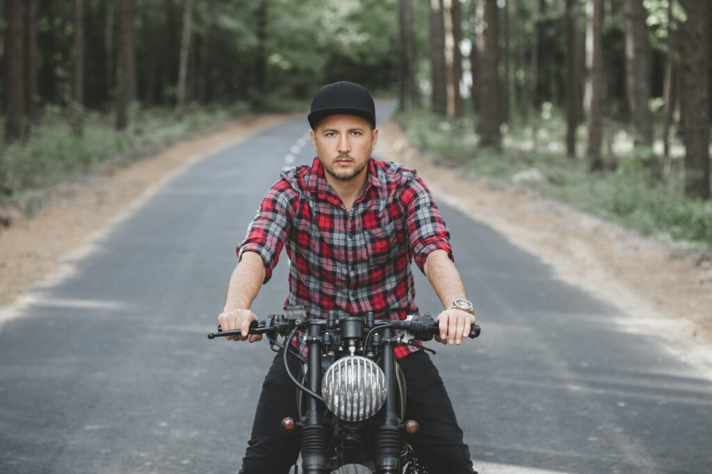 Man seat on the motorcycle